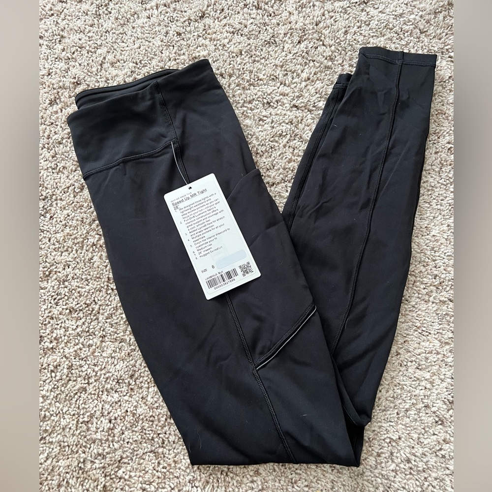 Lululemon- NWT- speed up mid rise tight- 28”- size 6- black with pockets!